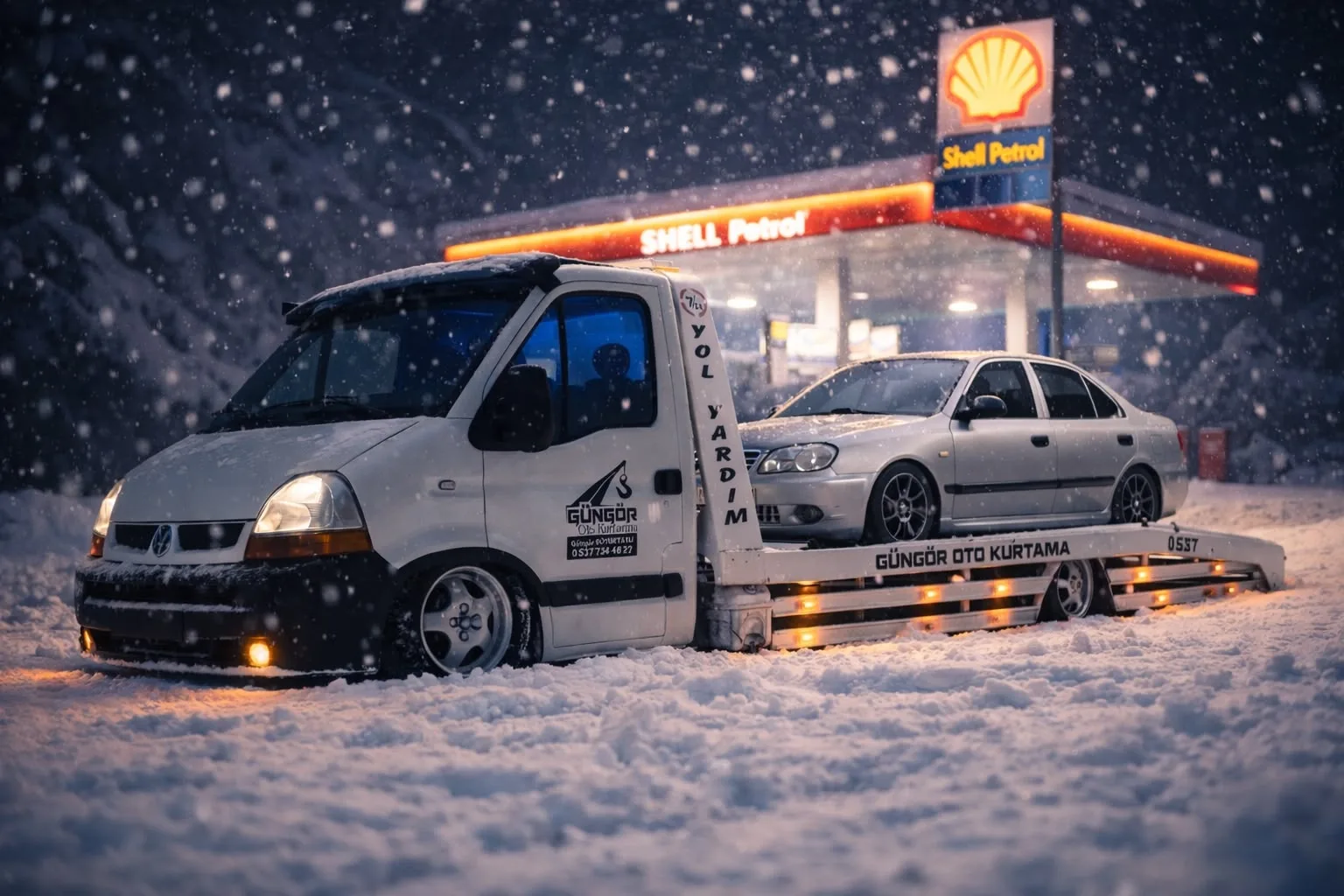 Kar ve dağ yolunda oto çekici